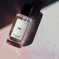 Simple People Simple Story AME Eau De Parfum 50ml by Formulum, sold at BeCandle - minimalist glass perfume bottle with white label and black cap.