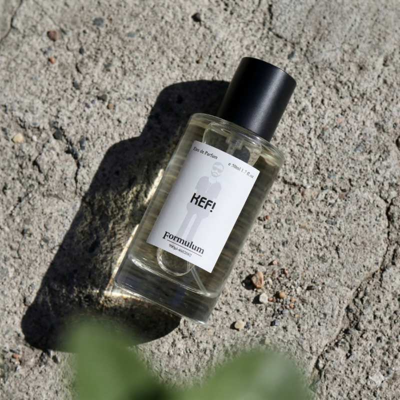 Simple People Simple Story KEFI Eau De Parfum 50ml by Formulum, sold at BeCandle - minimalist glass perfume bottle with white label and black cap on concrete surface.